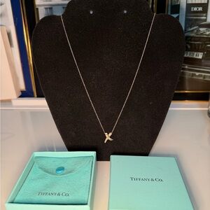 Authentic Tiffany & Co. Silver Necklace with Cross Pendant with the box.and COA